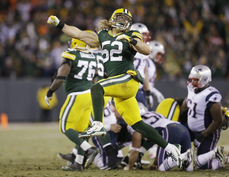 Green Bay Packers linebacker Clay Matthews celebrates during his team's win over the New England Patriots on Sunday in the NFL. Tom Lynn / AP / November 30, 2014  