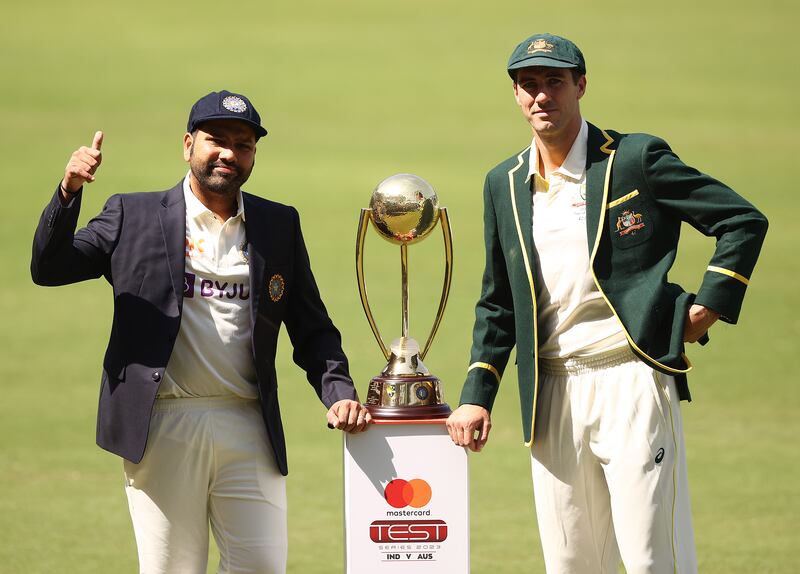 India captain Rohit Sharma and his Australian counterpart Pat Cummins with the Border-Gavaskar Trophy at the VCA Stadium in Nagpur on the eve of the first Test. Getty