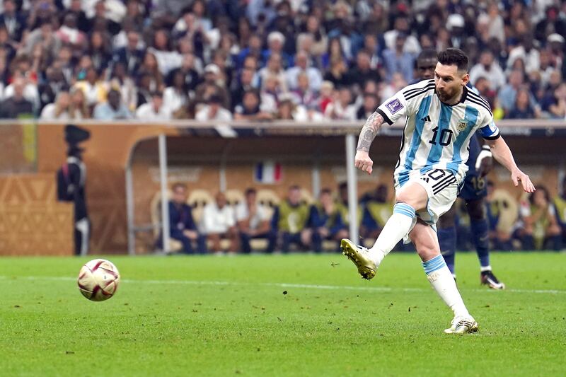 Lionel Messi scores from the spot for Argentina. PA
