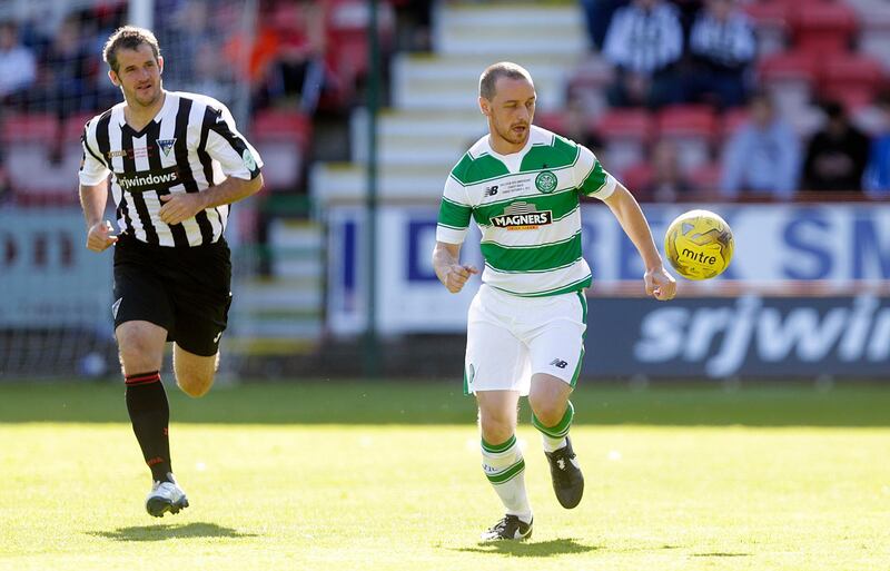 Football - Dunfermline Athletic v Celtic - Jock Stein 30th Anniversary Charity Match - East End Park - 6/9/15 
Dunfermline Legends' Stevie Crawford (L) in action with Celtic Legends' James McAvoy 
Action Images via Reuters / Graham Stuart 
Livepic 
EDITORIAL USE ONLY.