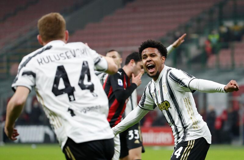 Juventus' Weston McKennie, right, celebrates with Dejan Kulusevski after scoring the third. AP