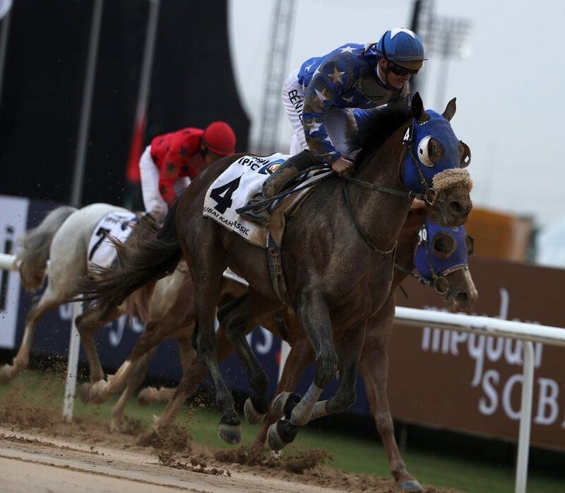 Harry Bentley rides Reda to win the Dubai Kahayla Classic. Karim Sahib / AFP