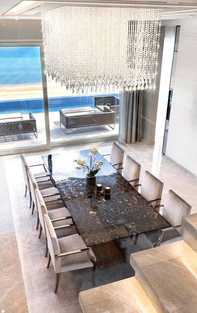 The formal dining room in the Palm Jumeirah Villa.