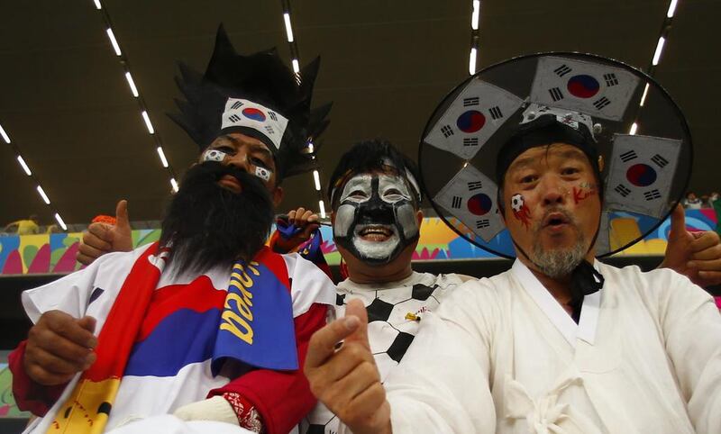 Fans of South Korea in Cuiaba. Eddie Keogh / Reuters