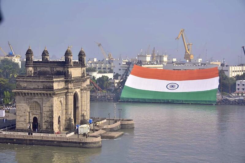 This handout photograph taken on December 4, 2021 and released by the Indian Navy shows a gigantic India's national flag exhibited by the Western Naval Command at the naval dockyard in Mumbai.  (Photo by INDIAN NAVY  /  AFP)  /  RESTRICTED TO EDITORIAL USE - MANDATORY CREDIT "AFP PHOTO / Indian Navy" - NO MARKETING - NO ADVERTISING CAMPAIGNS - DISTRIBUTED AS A SERVICE TO CLIENTS