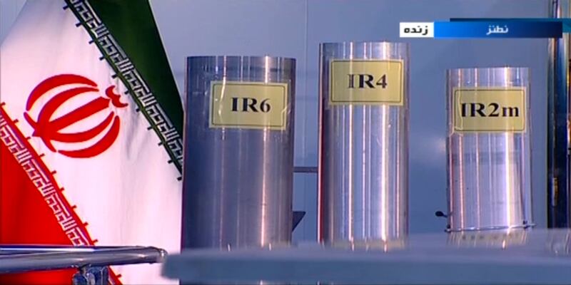 FILE - In this June 6, 2018 frame grab from the Islamic Republic Iran Broadcasting, IRIB, state-run TV, three versions of domestically-built centrifuges are shown in a live TV program from Natanz, an Iranian uranium enrichment plant, in Iran. (IRIB via AP, File)