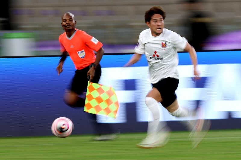 Takahiro Sekine of Urawa Reds drives the ball forward. EPA