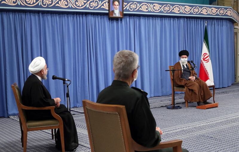 Iranian Supreme leader Ali Khamenei with Iranian President Hassan Rouhani, during a cabinet meeting on the coronavirus crisis in the country, at the supreme leader's office in Tehran, Iran. EPA