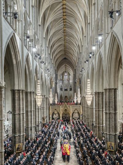 The coffin of Queen Elizabeth II is carried out of Westminster Abbey after her funeral. PA 