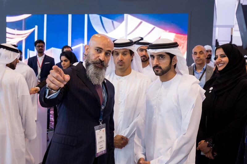 Sheikh Hamdan bin Mohammed, Crown Prince of Dubai, visits the Cisco stand at Gitex Technology Week, where he was shown around by Shukri Eid, the managing director of Cisco.  Courtesy Cisco Middle East Twitter