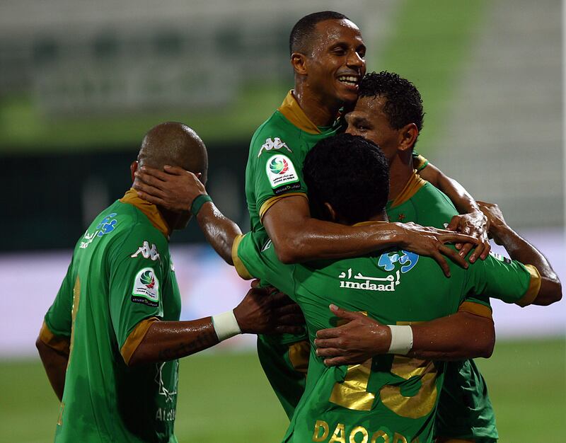 Dubai, United Arab Emirates-October 28, 2012;    Al Shabab players celebrates after scoring the second goal against Ajman during the Etisalat Pro-League  match between  Al Shabab and Ajman at the Shahbab Stadium  in Dubai . (  Satish Kumar / The National ) For Sports