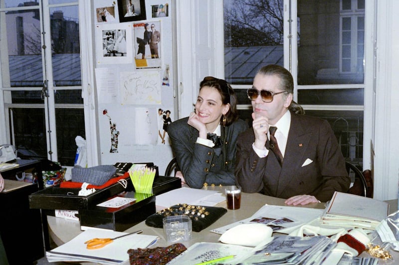 Lagerfeld is seen with model Ines de la Fressange in this photo taken on March 13, 1987. AFP
