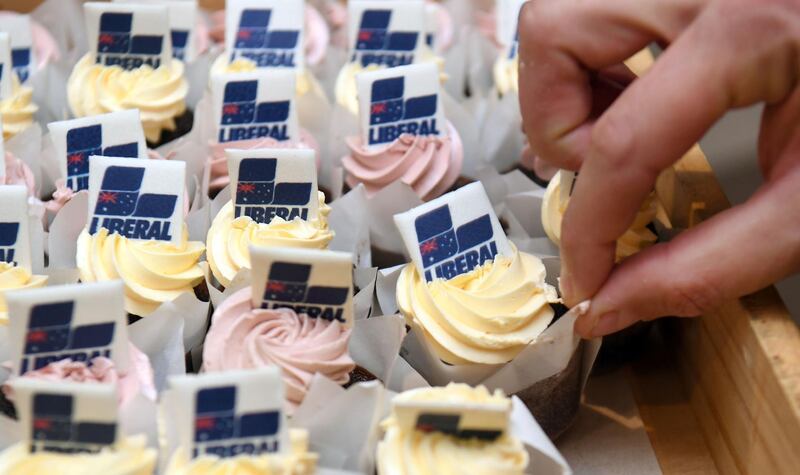 Liberal Party cupcakes are handed out to the party faithful and media before Australia's Prime Minister Scott Morrison address to the Liberal Party's campaign launch in Melbourne. AFP