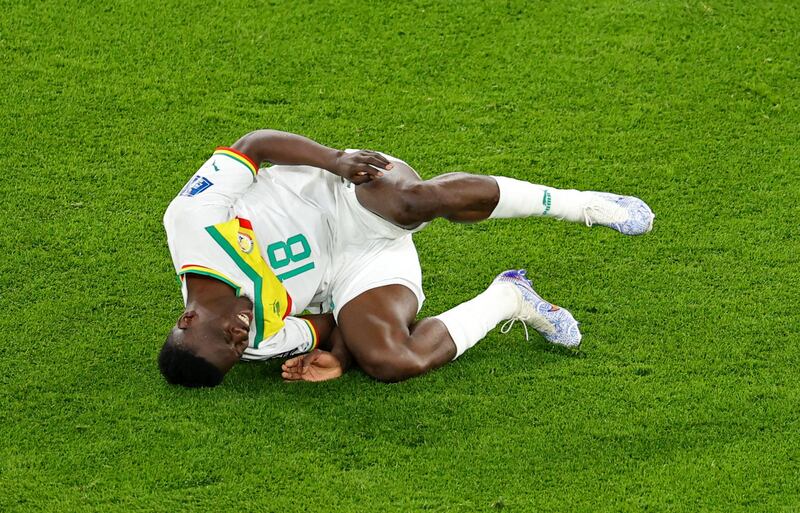 Senegal's Ismaila Sarr is injured. Reuters