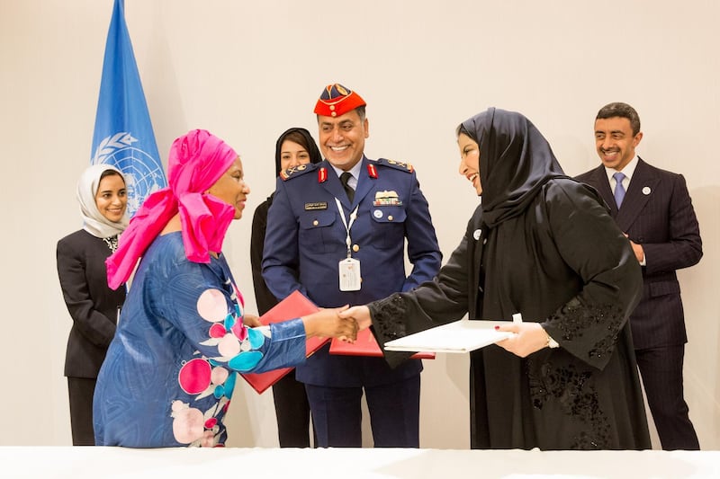 Phumzile Mlambo-Ngcuko, director of UN Women, Sheikh Abdullah bin Zayed, Minister of Foreign Affairs and International Co-operation, and Noura Al Suwaidi, director general of The General Women’s Union at the signing of an initiative in 2018 that will help build Arab women get into the military and peacekeeping forces. Credit: UN Women