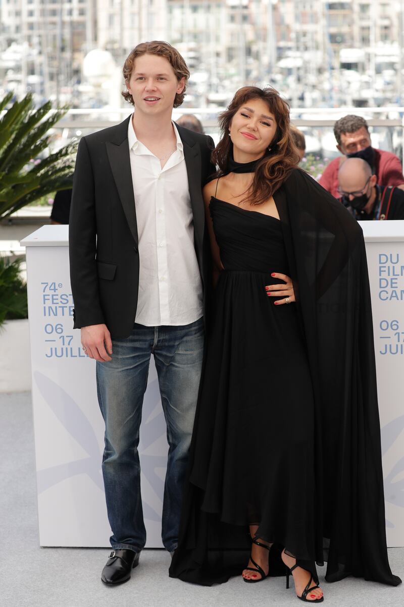 Mercedes Kilmer and Jack Kilmer, children of actor Val Kilmer, pose at a photo call for 'Val' during the 74th annual Cannes Film Festival on July 7, 2021.