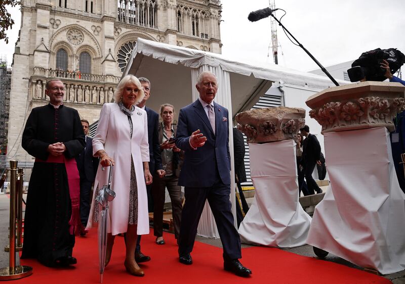 King Charles and Queen Camilla view reconstruction work at Notre-Dame cathedral in Paris. Reuters