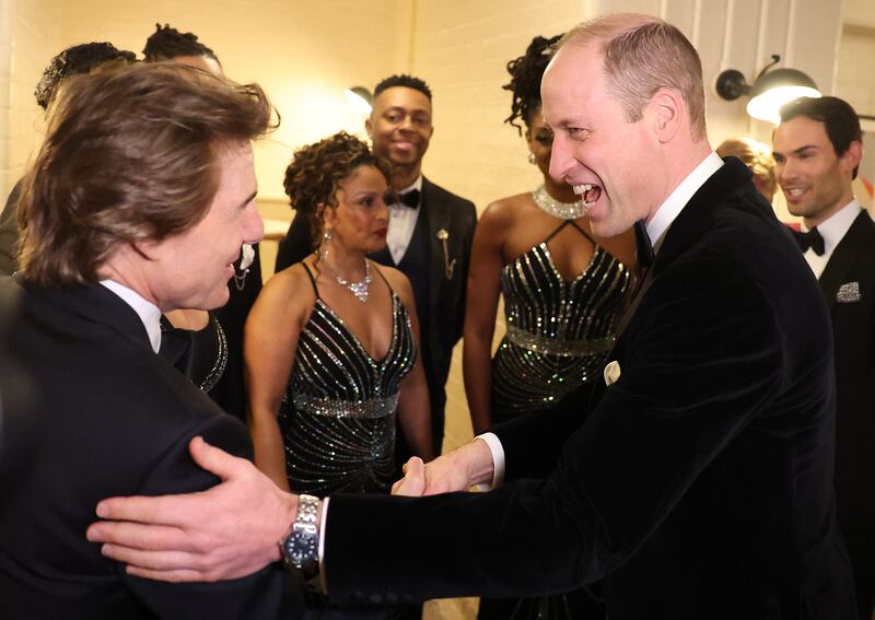 Cruise and Prince William get reacquainted. Getty Images