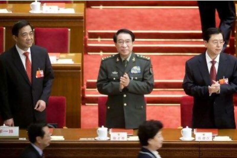 The removal of Bo Xilai, left, the strongest rebuke of a Politburo member in the past five years.