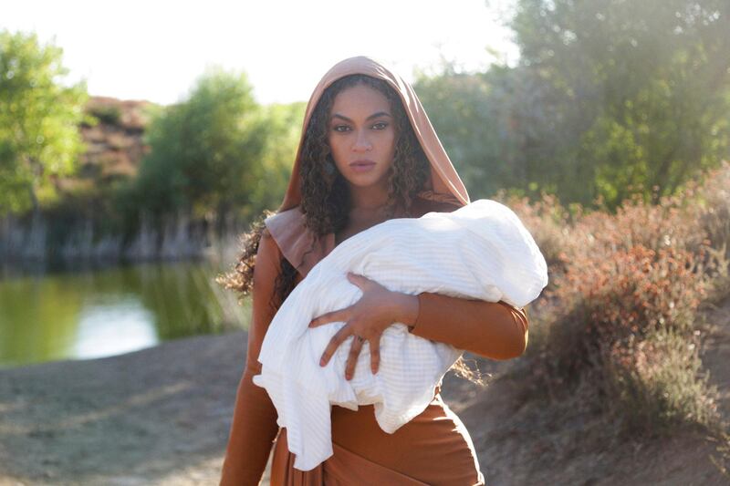 This image released by Disney Plus shows BeyoncÃ© in a scene from her visual album "Black is King," premiering Friday on Disney Plus. (Robin Harper/Parkwood Entertainment/Disney + via AP)