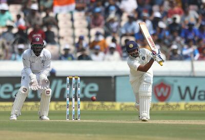 India's Prithvi Shaw bats during the second day of the second cricket test match between India and West Indies in Hyderabad, India, Saturday, Oct. 13, 2018. (AP Photo/Mahesh Kumar A.)
