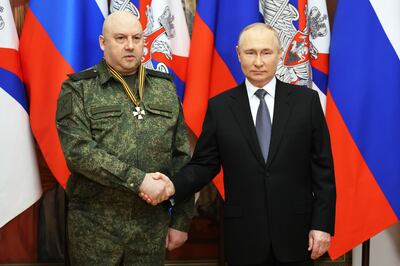 President Vladimir Putin with Gen Sergei Surovikin, the former commander of Russia's military operation in Ukraine. AP