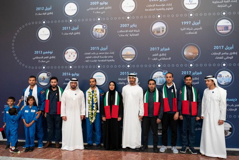 Sheikh Mohamed bin Zayed, Sheikh Hamdan bin Zayed and Sheikh Hazza bin Zayed, stand for a photo wish Hazza Al Mansouri, Sultan Al Neyadi, Salem Al Marri, head of the National Space Programme. Courtesy Sheikh Mohamed bin Zayed Twitter