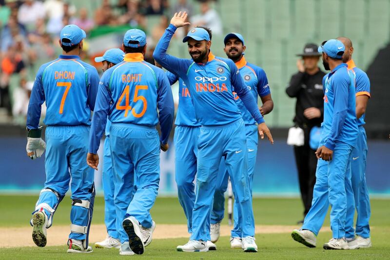 India's captain Virat Kohli celebrates with his teammates after the dismissal of Australia's Aaron Finch off the bowling of Bhuvneshwar Kumar during the third one-day international match between Australia and India at the MCG in Melbourne, Australia, January 18, 2019. AAP/Mark Dadswell/via REUTERS  ATTENTION EDITORS - THIS IMAGE WAS PROVIDED BY A THIRD PARTY. NO RESALES. NO ARCHIVE. AUSTRALIA OUT. NEW ZEALAND OUT.