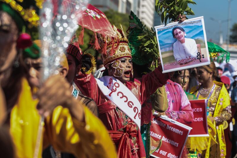 Traditional Myanmar spirit mediums take part in a demonstration in Yangon to oppose the country's military coup. AFP