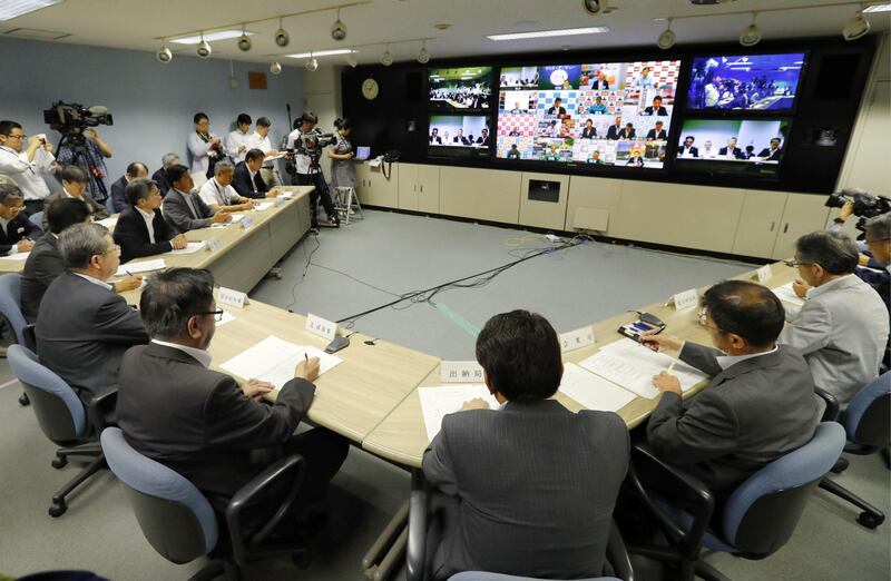 A teleconference is held at Hokkaido Government in Sapporo, northern Japan after North Korea fired a missile over Japan on Tuesday, August 29, 2017. Masanori Takei / Kyodo News via AP
