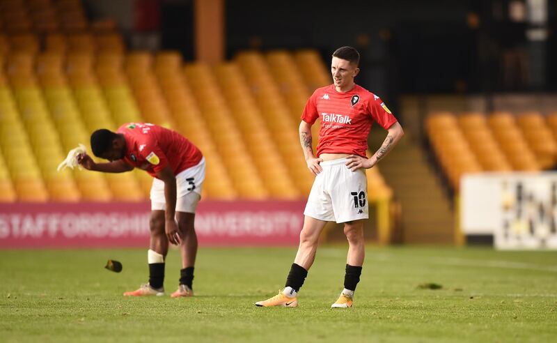 Salford's Ibou Touray and Ash Hunter after the final whistle at Port Vale. Getty