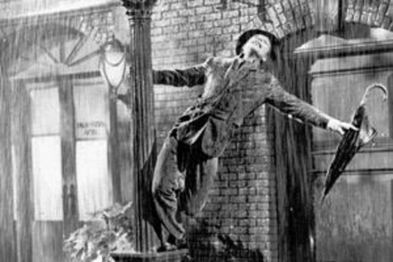 Gene Kelly's Singin' in the Rain is the quintessential dance scene.