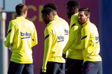 epa08194508 FC Barcelona players Samuel Umtiti (2-R) and Lionel Messi (R) attend their team's training session at Sant Joan d'Espi sports city near Barcelona, Spain, 05 February 2020. FC Barcelona will face Athletic Bilbao in their Spanish King's Cup quarter final soccer match on 06 February 2020. EPA/ENRIC FONTCUBERTA
