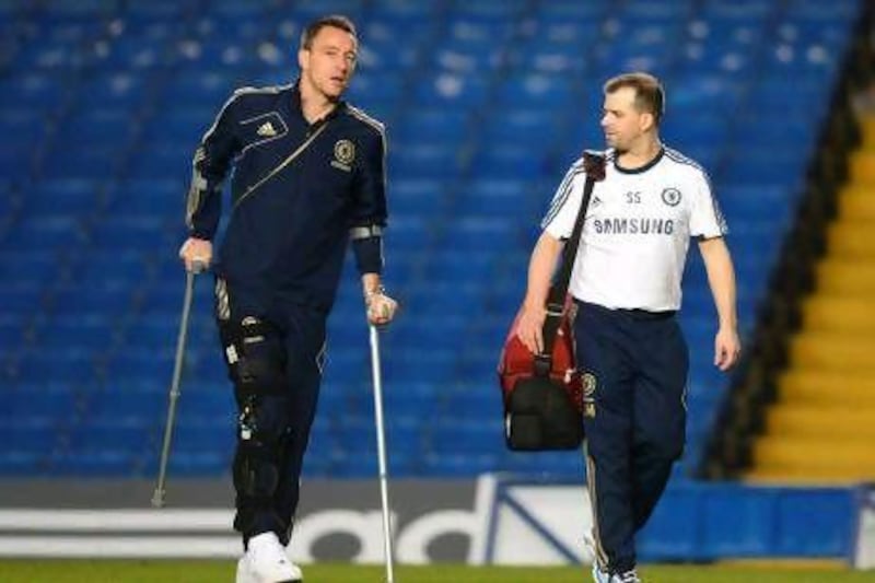 MRI scans on John Terry's knee reportedly show no significant damage to the cruciate ligaments. Adrian Dennis / AFP