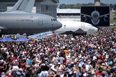 Visitors walk on the tarmac during the 2019 International Paris Air Show at Le Bourget Airport, near Paris. The 2021 edition of Paris Air Show is cancelled, organisers announced on December 7, 2020.  AFP.