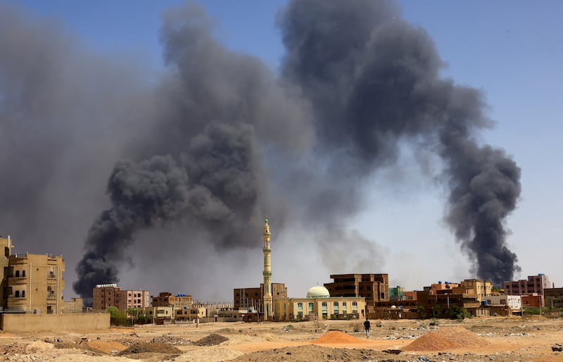 Smoke rises above buildings after an aerial bombardment in Khartoum. Reuters