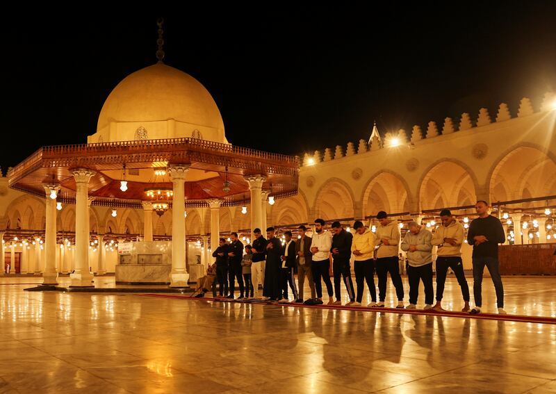 Devotees attend taraweeh on the eve of Ramadan at Amr bin Al-Aas Mosque, Cairo. Reuters