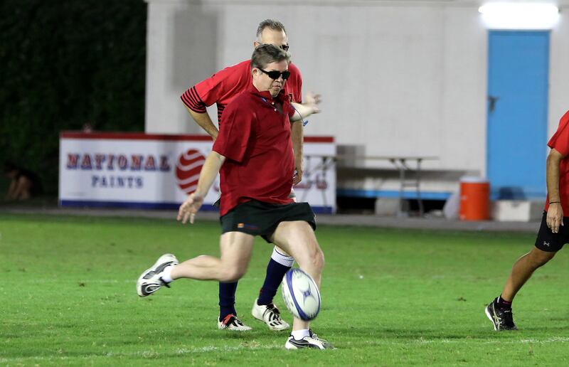 SHARJAH , UNITED ARAB EMIRATES , OCT 20   – 2017 :- Hamish Mackenzie kicking the rugby ball to start the match of Sharjah Wanderers present team vs Sharjah Wanderers past team during the Sharjah Wanderers 40th anniversary exhibition match held at Sharjah Wanderers Club in Sharjah. (Pawan Singh / The National) Story by Paul