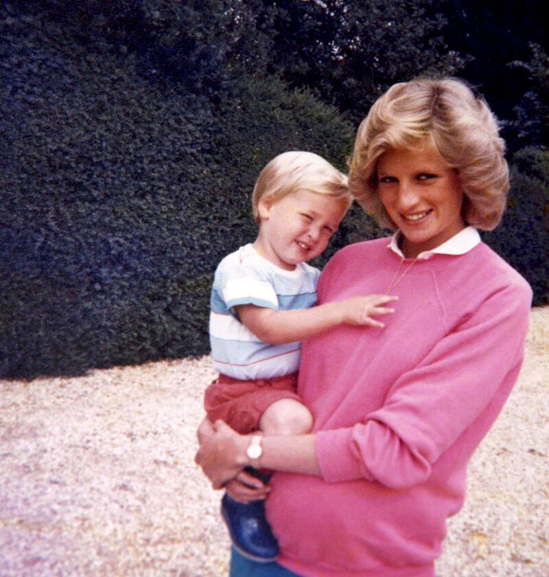 In this photo made available by Kensington Palace from the personal photo album of the late Diana, Princess of Wales, shows the princess holding Prince William whilst pregnant with Prince Harry, and features in the new ITV documentary 'Diana, Our Mother: Her Life and Legacy.' Prince William and Prince Harry will pay tribute to their mother, Princess Diana, as the 20th anniversary of her death in a car crash approaches in a TV documentary â€œDiana, Our Mother: Her Life and Legacyâ€ which will air Monday July 24, 2017 on British TV. (The Duke of Cambridge and Prince Harry/Kensington Palace via AP)  NO USE ON THE FRONT COVERS OF ANY UK OR INTERNATIONAL MAGAZINES. NO COMMERCIAL USE (including any use in merchandising, advertising or any other non-editorial use including, for example, calendars, books and supplements).