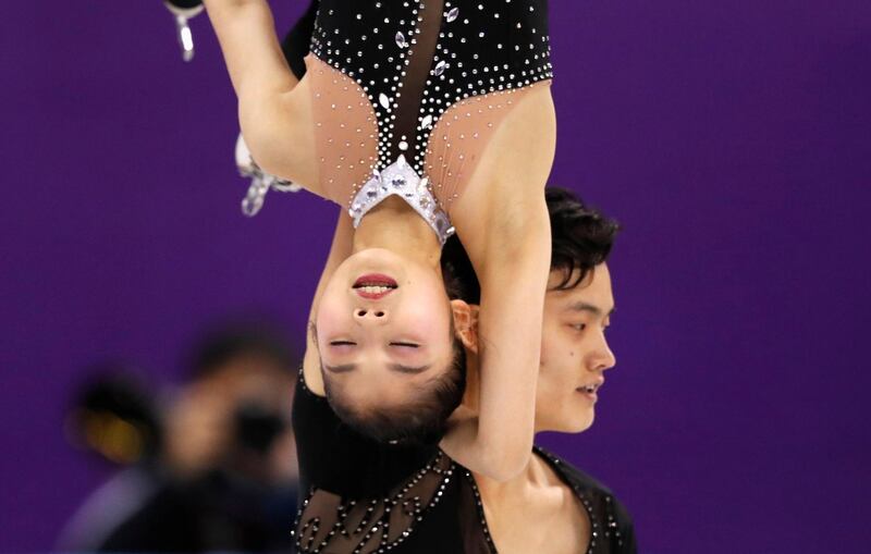 Ryom Tae Ok and Kim Ju Sik of North Korea in the Pair Skating free skating competition final. Damir Sagolj / Reuters