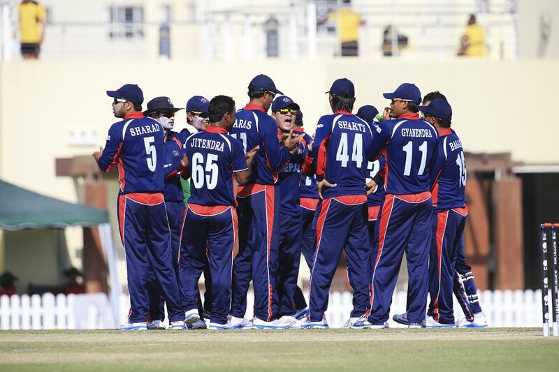 The Nepal cricket side had the support of a couple of hundred expatriates cheering them at the ICC Academy in Dubai on Saturday. Sarah Dea / The National