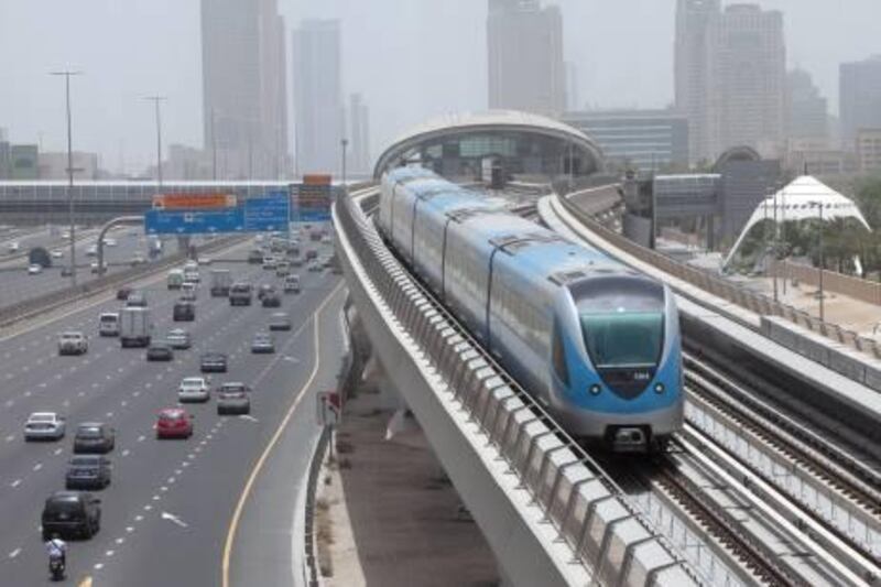 Dubai - June 12, 2011 - The southbound Red Line metro leaves the Nakheel Station in Dubai, June 12, 2011. (Photo by Jeff Topping/The National) 

 