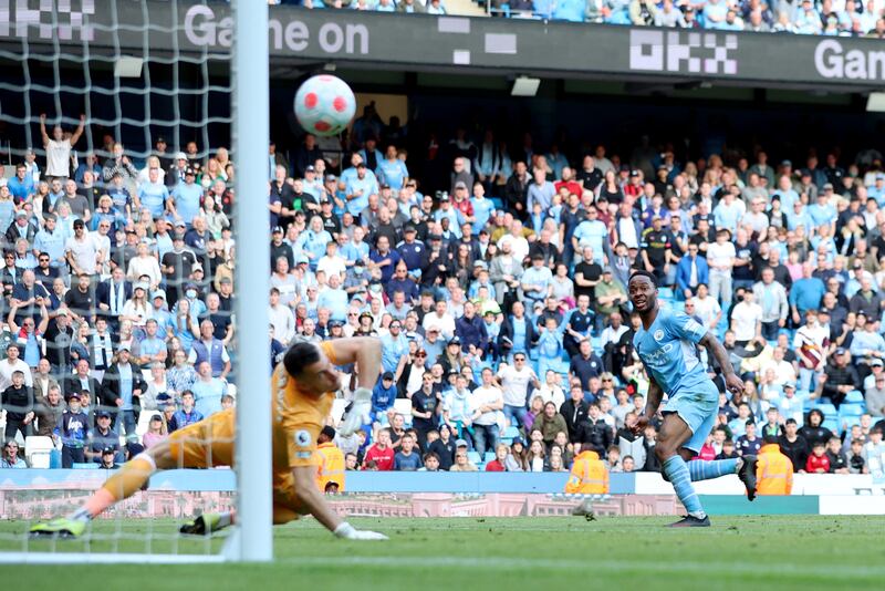 City attacker Raheem Sterling scores their fifth goal. Reuters