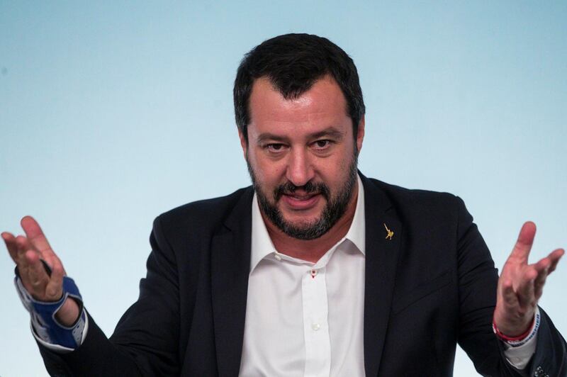 Vice premier Matteo Salvini gestures during a press conference at Chigi's Palace, in Rome, Saturday, Oct. 20 2018. Italy's government vowed Saturday to engage in constructive talks with the European Union as it still gave final approval to a rule-busting budget and brushed off a ratings downgrade triggered by its higher-than-expected deficit targets. (Angelo Carconi/ANSA via AP)