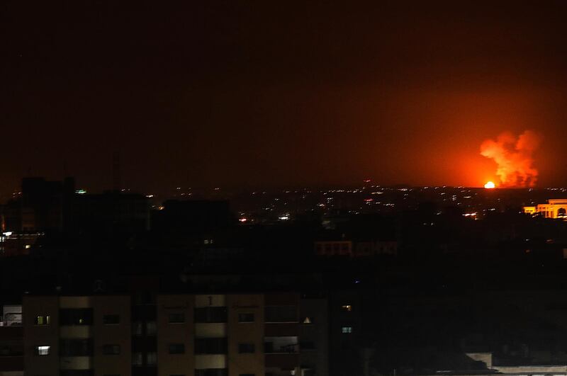 A ball of fire is seen after an Israeli air strike in the southern Gaza Strip.  EPA