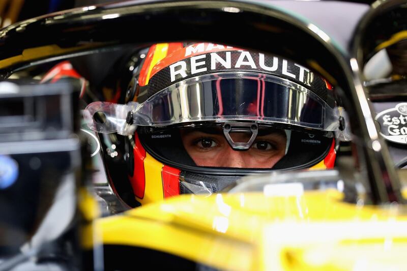 BAHRAIN, BAHRAIN - APRIL 06:  Carlos Sainz of Spain and Renault Sport F1 prepares to drive during practice for the Bahrain Formula One Grand Prix at Bahrain International Circuit on April 6, 2018 in Bahrain, Bahrain.  (Photo by Lars Baron/Getty Images)