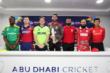 Left to right at T20 World Cup Qualifier captains' press conference on Sunday: Ademola Onikoyi of Nigeria, Jersey's Charlie Perchard, Gary Wilson of Ireland, UAE's Ahmed Raza, Navneet Dhaliwal of Canada, Oman's Zeeshan Maqsood, and Aizaz Khan of Hong Kong. Chris Whiteoak / The National