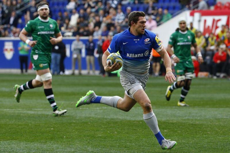 Saracens' Alex Goode runs in for a try during the first half of their Premiership win over London Irish in New Jersey on Saturday. Julio Cortez / AP / March 12, 2016 