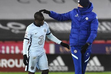 Chelsea manager Thomas Tuchel with N'Golo Kante after the English Premier League soccer match between Sheffield United and Chelsea at Bramall Lane stadium in Sheffield, England, Sunday, Feb. 7, 2021. (Oli Scarff/ Pool via AP)