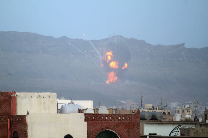 An explosion is seen at the Noqum Mountain after it was hit by an air strike in Yemen's capital Sanaa May 19, 2015. (REUTERS/Mohamed al-Sayaghi)